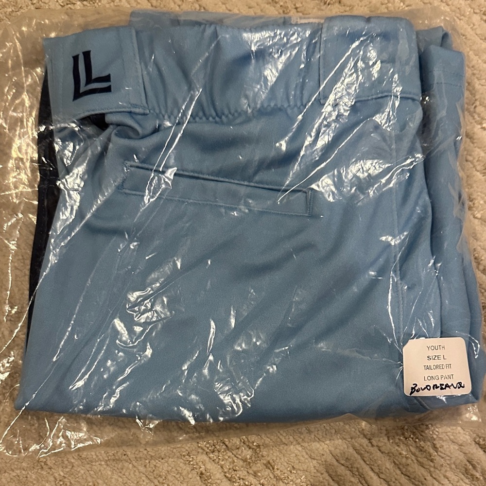 Youth Luccini Blue Baseball Pants with navy stripe